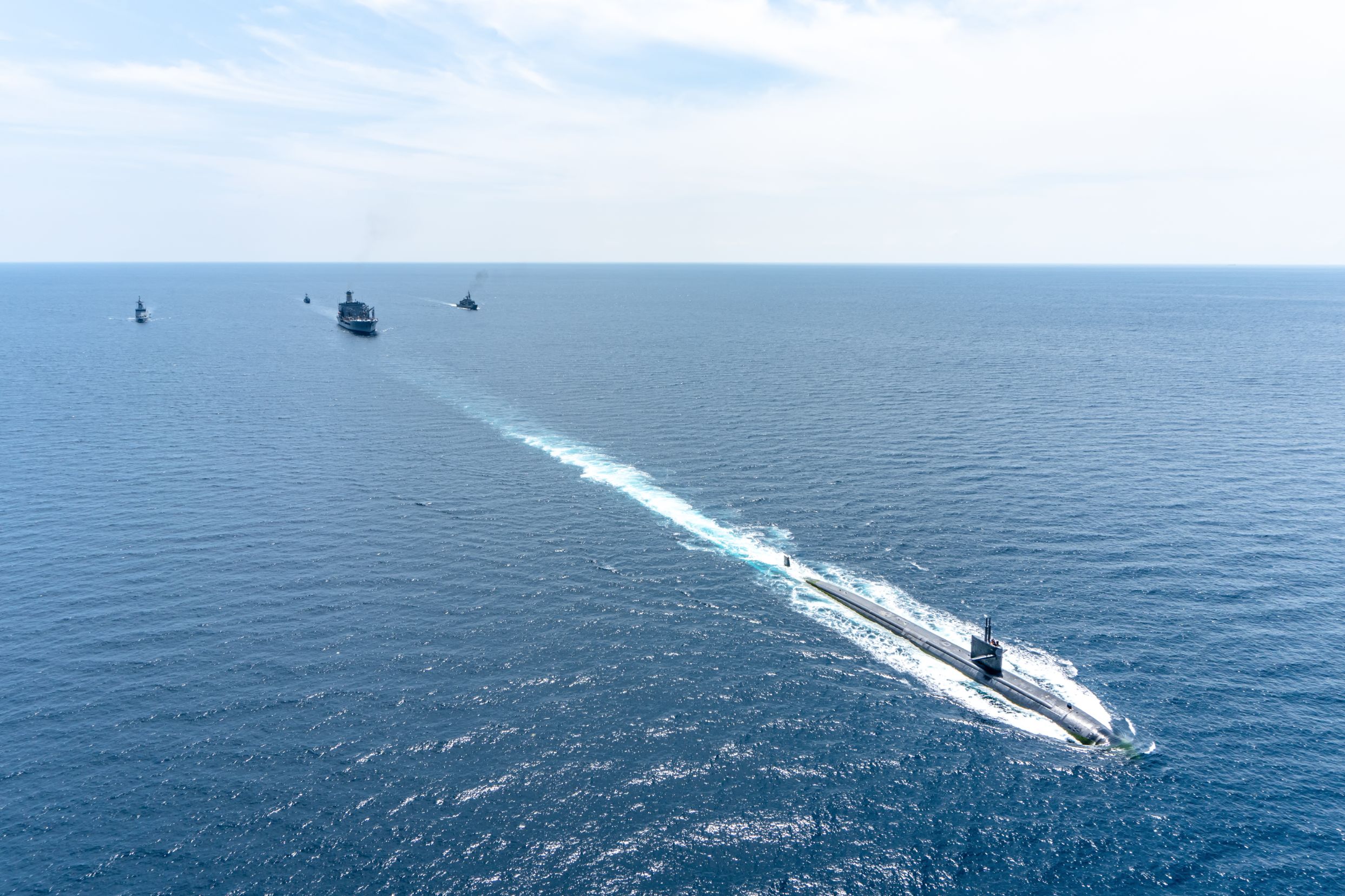 PHUKET, THAILAND - APRIL 9, 2018 : USS Louisville (SSN-724) fast attack submarine of U.S.Navy sails in front of the fleet during Guardian Sea 2019 Exercise.