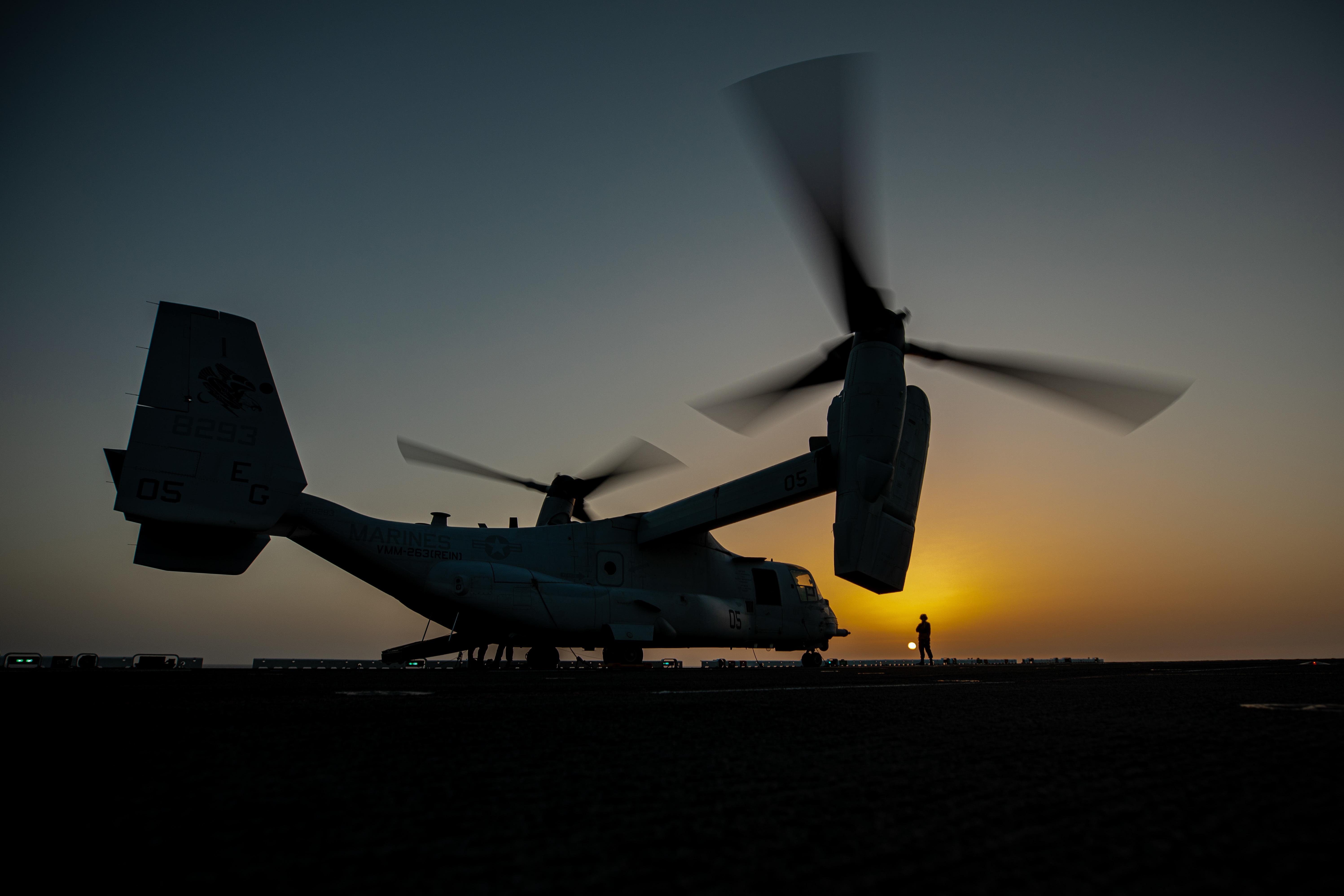 A U.S. Marine Corps MV-22 Osprey with the Aviation Combat Element, 22nd Marine Expeditionary Unit (MEU), is positioned on the flight deck during preflight checks aboard the Wasp-class amphibious assault ship USS Kearsarge (LHD 3), in the Atlantic Ocean, July 25, 2022. The Kearsarge Amphibious Ready Group and embarked 22nd MEU, under the command and control of Task Force 61/2, is on a scheduled deployment in the U.S. Naval Forces Europe area of operations, employed by U.S. Sixth Fleet to defend U.S., allied and partner interests. (U.S. Marine Corps photo by Cpl. Yvonna Guyette)